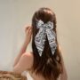 Serenity Pearl Bow – Black & White Pattern Hair Clip with Pearl Accent ✨🤍 - Image 2