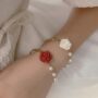 Red Rose Pearl Charm Bracelet – Elegant Bloom Jewelry 🌹✨ - Image 2