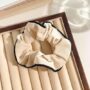 Elegant Edge Scrunchie – Beige & Black Contrast Hair Tie