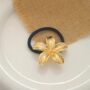 Luxe Metallic Lily Hair Tie – Golden Flower Elastic Band - Image 3