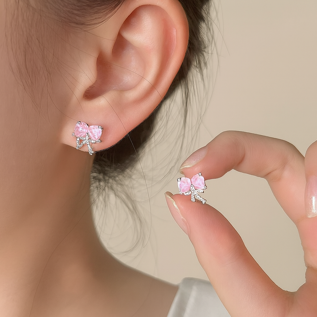 f2144b72-705d-4e5e-8106-d2c973b22043 ππ¦ Pastel Pink Butterfly Bow Earrings | Blush Wing Crystal Stud Jewelry - Image 1